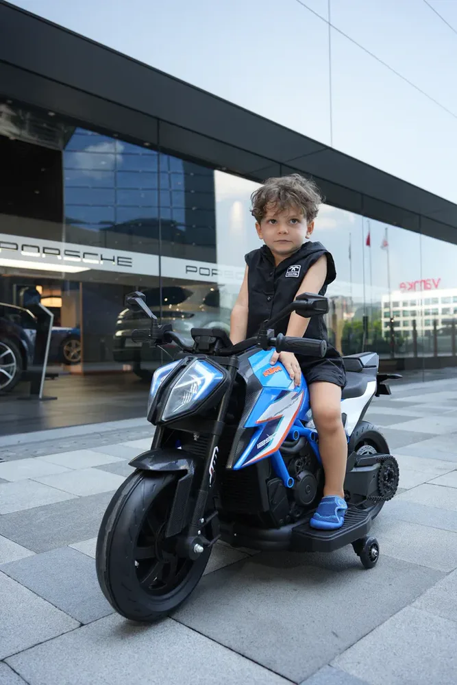 אופנוע סופרמוטו חשמלי לילדים - KTM - קיי.טי.אם דיוק 1290 12V